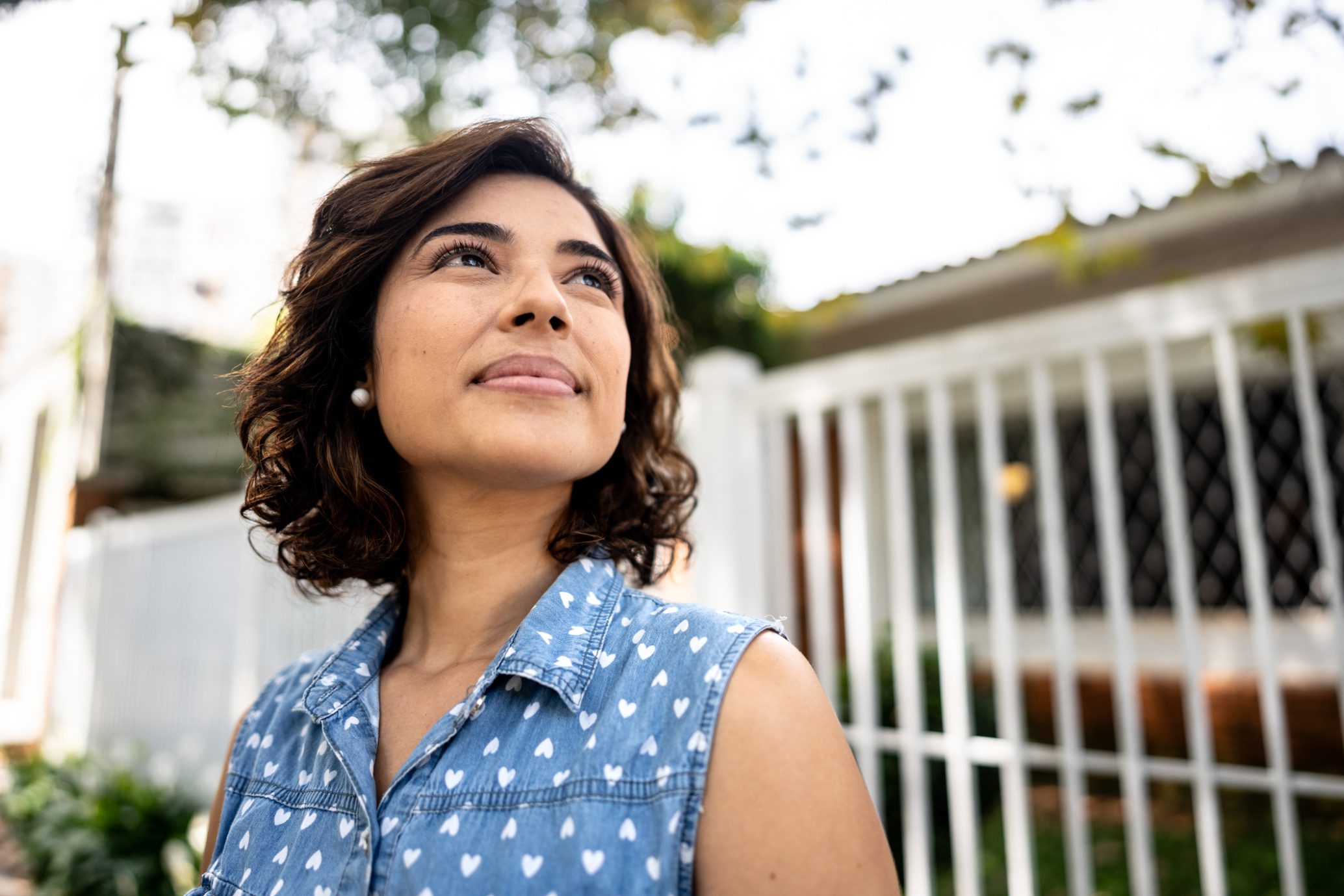 Mid adult woman contemplating outdoors TMS Therapy or Antidepressants? Which Is Best for Treatment-Resistant Depression?
